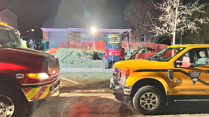 Photo at the scene of a fatal trench collapse on Aspen Drive in Buffalo Grove on Monday, December 12, 2022