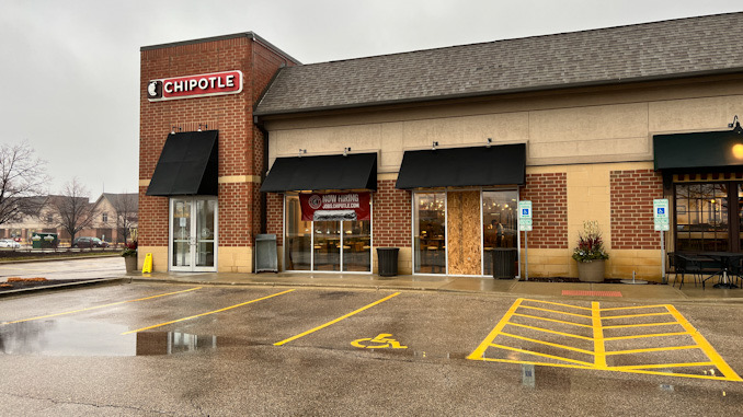 Broken window at Chipotle in commercial burglary, overnight, early morning, Wednesday, December 14, 2022.