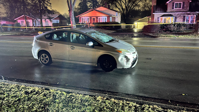 Damaged Toyota Prius after the vehicle was involved in a collision with a pedestrian that was walking a dog on Kirchoff Road west of Dove Street in Rolling Meadows, Friday, December 9, 2022