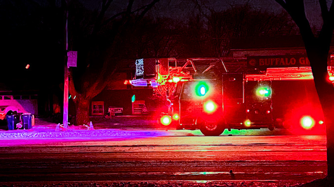 Buffalo Grove Fire Department, tower ladder crew on the scene of a down powerline, a primary line from pole to pole on Dundee Road near Golfview Terrace.