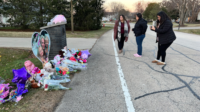 Roadside memorial for Vivian Kisliak, age 6; Vera Kisliak, age 36; and Amilia Kisliak, age 4