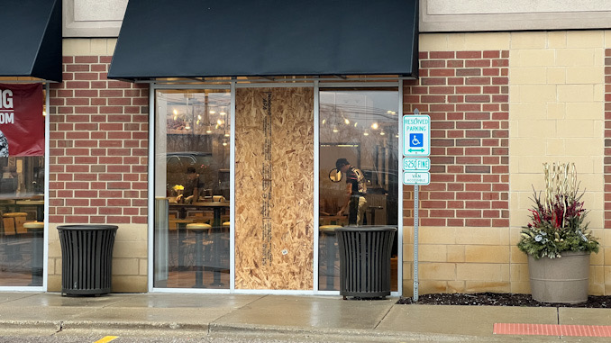 Broken window at Chipotle in commercial burglary, overnight, early morning, Wednesday, December 14, 2022.