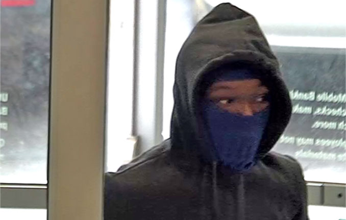 Bank robbery suspect at Buffalo Grove Bank of America; initially only photo available of one of the suspects (SOURCE: Bank surveillance image)