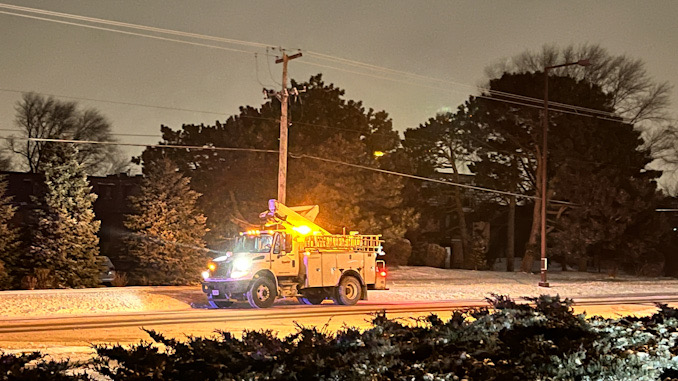 Buffalo Grove Fire Department, tower ladder crew on the scene of a down powerline, a primaryi line from pole to pole on Dundee Road near Golfview Terrace.