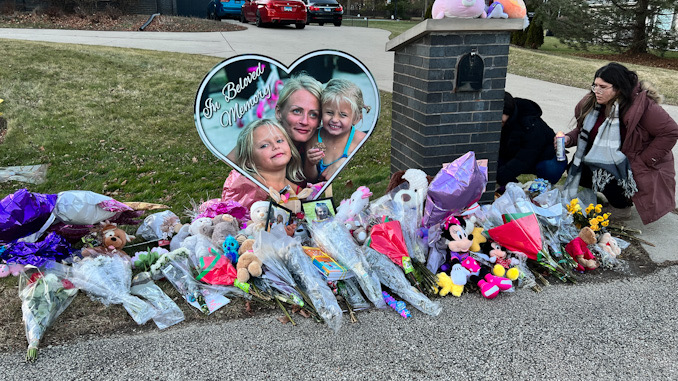 Roadside memorial for Vivian Kisliak, age 6; Vera Kisliak, age 36; and Amilia Kisliak, age 4