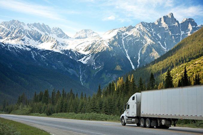 Freight truck moving west toward mountains