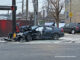 Crashed dark sedan where a person was trapped in the vehicle in a crash at Milwaukee Avenue and Howard Street in Niles (SOURCE: Jake/@UpdatesNorth/CapturedNews)