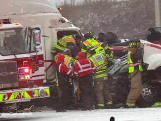 Firefighters and paramedics working to extrication at truck driver after a crash on I-94 EAST near Gurnee on Thursday, December 22, 2022 during a winter storm (PHOTO CREDIT: Joe Schuman/CapturedNews)