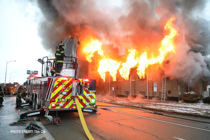 Fire out the windows at the former Rock of Ages Baptist Church building in Maywood at 1642 South 15th Avenue in Maywood on Monday, December 26, 2022 (PHOTO CREDIT: Tim Olk/Photo Unit)