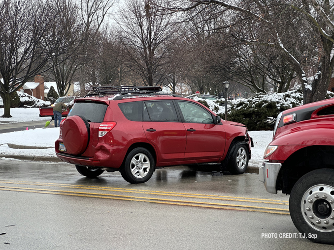 Two-car crash with compact SUV into a light pole at Kirchoff Road and Highland Avenue in Arlington Heights, January 25, 2023 (PHOTO CREDIT: T.J. Sep).