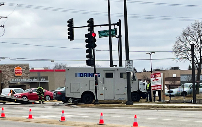 Brink's truck crash with another vehicle at Meacham Road and Biesterfield Road in Elk Grove Village, Wednesday, January 18, 2023