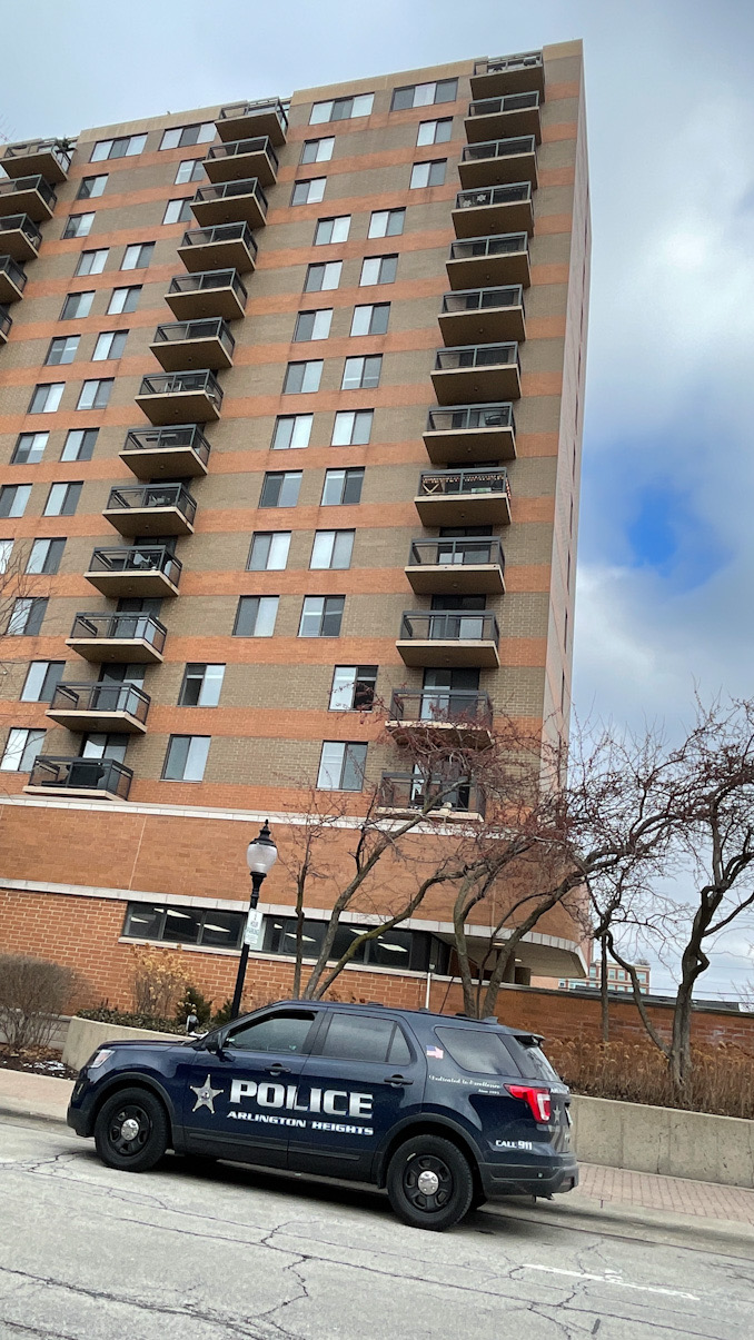 Police on scene at Dunton Tower waiting for a social service staff member from Village of Arlington Heights Health, Human & Disability Services to arrive Tuesday, January 24, 2023