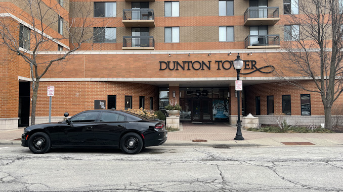 Police investigators at the front entrance at Dunton Tower Apartments, 55 South Vail Avenue on Tuesday, January 24, 2023