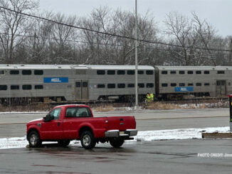 Metra Train #712 at about 12:00 p.m. stopped on the UP Northwest Line just west of Ela Road after striking and killing a pedestrian (PHOTO CREDIT: Jimmy Bolf)