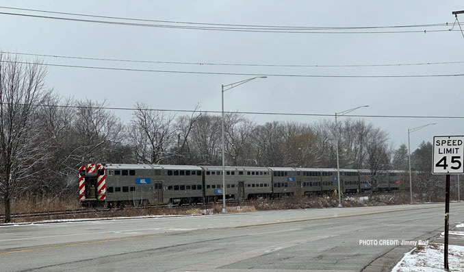 Metra Train #712 at about 12:00 p.m. stopped on the UP Northwest Line just west of Ela Road after striking and killing a pedestrian (PHOTO CREDIT: Jimmy Bolf)