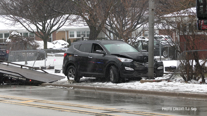 Two-car crash with compact SUV into a light pole at Kirchoff Road and Highland Avenue in Arlington Heights, January 25, 2023 (PHOTO CREDIT: T.J. Sep)