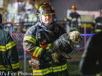 Skokie Fire Department Squad 18's crew was connected to work involving a dog rescue at an extra alarm apartment fire near Noel Street and Margail Avenue in Des Plaines (Jimmy Bolf/Bolf's Fire Photos)