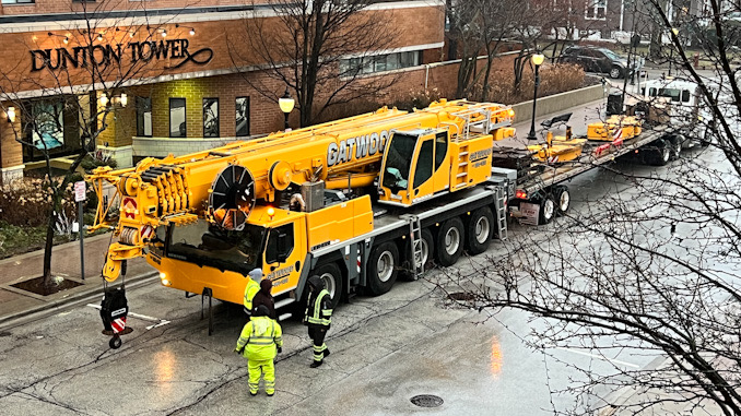 Large crane before operation at Dunton Tower, 55 South Vail Avenue in Arlington Heights, Monday morning, February 27, 2023