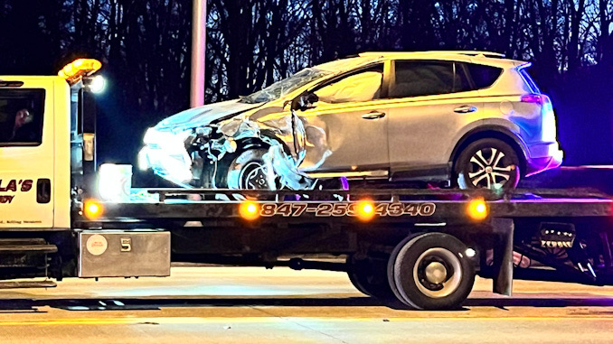 The driver of this car was transported to Northwest Community Hospital after the driver rear-ended a Palatine Police Department SUV and the car rolled over on Northwest Highway, Monday, February 6, 2023
