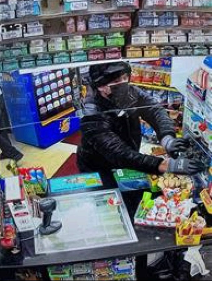 Armed robber on security camera during Beach Park gas station armed robbery on Monday, February 20, 2023 (SOURCE: Lake County Sheriff's Office)