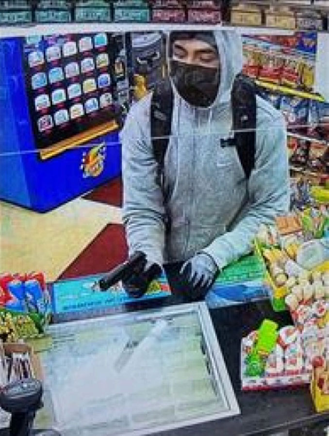 Armed robber on security camera during Beach Park gas station armed robbery on Monday, February 20, 2023 (SOURCE: Lake County Sheriff's Office)