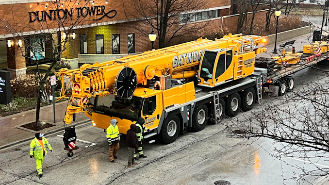 Large crane before operation at Dunton Tower, 55 South Vail Avenue in Arlington Heights, Monday morning, February 27, 2023