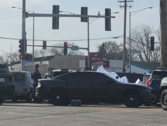 Palatine police investigated the scene where a homeless person was found dead in a silver Lincoln Town Car Thursday afternoon, March 23, 2023.