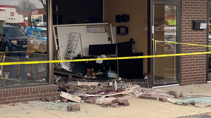 Damaged storefront and furnishings at Scruples Hair Technique on Rand Road near Beverly Avenue in Arlington Heights