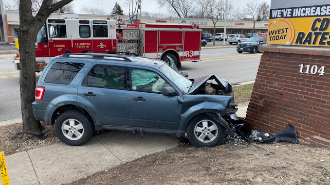 One-vehicle crash into a brick sign at Arlington Heights Road and Magnolia Street in Arlington Heights on Saturday, March 18, 2023