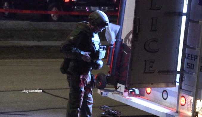 A police officer with tactical attire and tactical gear on Tonne Drive Tuesday, March 14, 2023