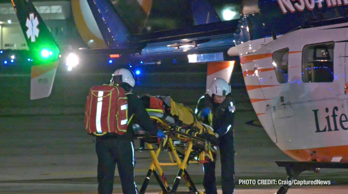 Patient being loaded onto a LifeNet medical transport helicopter at Waukegan National Airport after a crash at Lewis Avenue and Bonnie Brook Lane in Waukegan (SOURCE: Craig/CapturedNews)