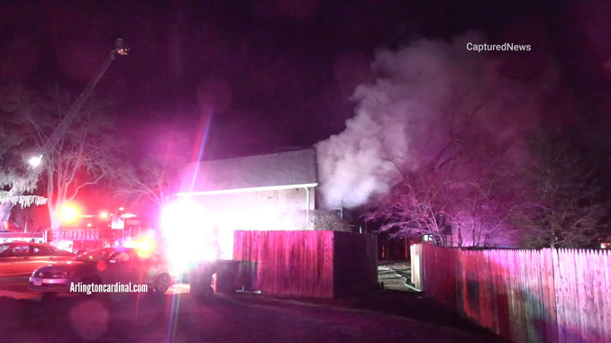 Smoke showing from the back of an apartment building where two people died on Sunday, March 19, 2023 (CARDINAL NEWS)