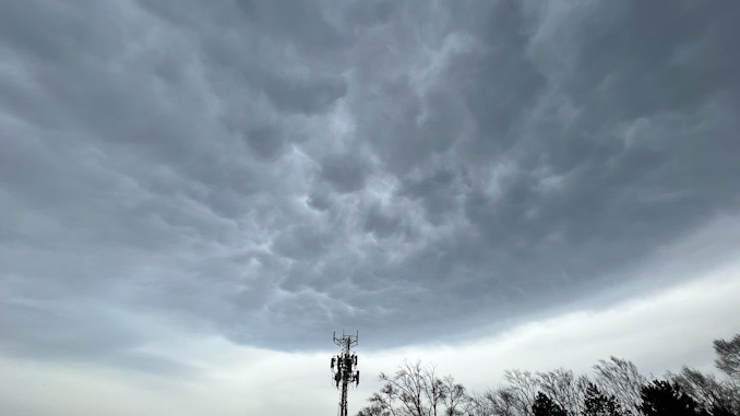 Turbulent clouds over the Target store at Rand Road and Thomas Street in Arlington Heights ahead of a thunderstorm with lightning, moderate winds, and quick heavy rain on Thursday evening, April 20, 2023