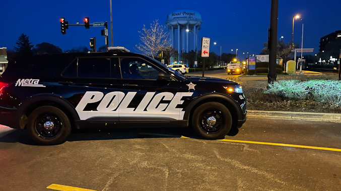 Metra police investigating the scene where a juvenile was almost hit by a second Metra train at the Emerson Street crossing in downtown Mount Prospect on Tuesday, April 18, 2023