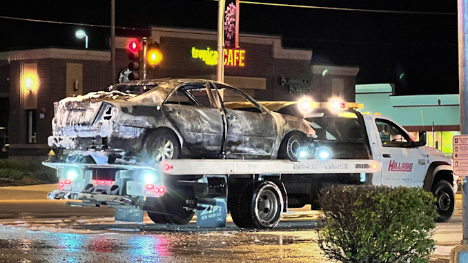 Burned up car on a Hillside tow truck after a vehicle fire was extinguished about 1:04 a.m. Wednesday, April 26, 2023