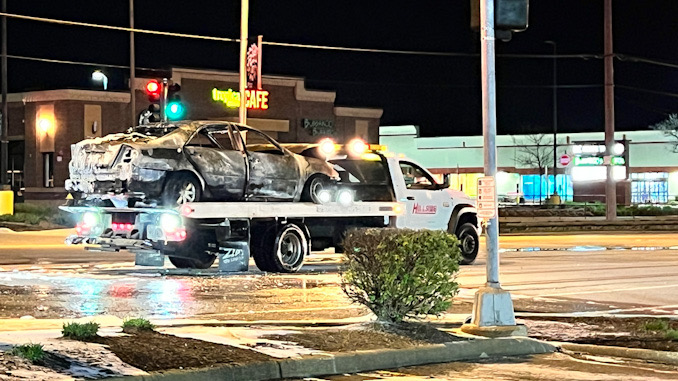 Burned up car on a Hillside tow truck after a vehicle fire was extinguished about 1:04 a.m. Wednesday, April 26, 2023.