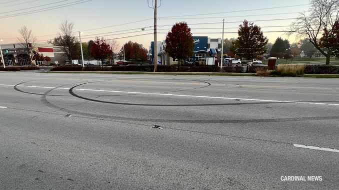 Tire marks from donuts last Fall on Saturday morning, October 29, 2022 in Arlington Heights on Northwest Highway near Waterman Avenue where Culver's is located in Arlington Heights near the border with Mount Prospect