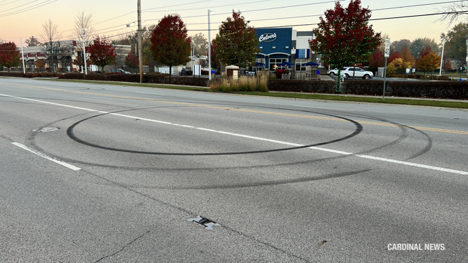 Tire marks from donuts last Fall in Arlington Heights on Northwest Highway near Waterman Avenue where Culver's is located in Arlington Heights near the border with Mount Prospect