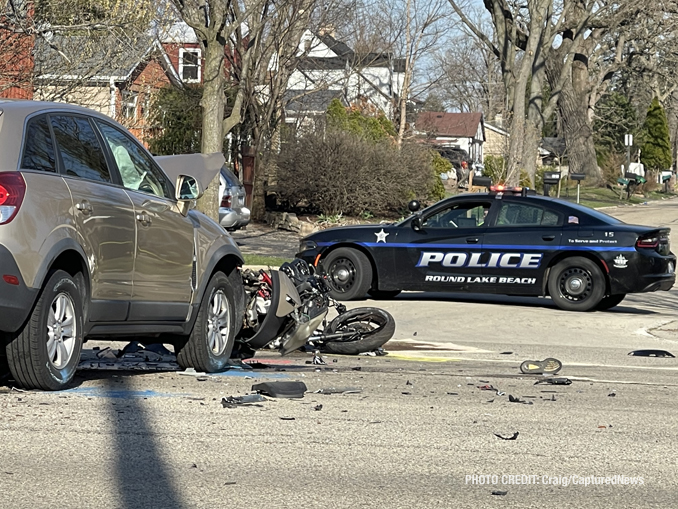 SUV and motorcycle in crash at Cedar Lake Road and Ferndale Drive Round Lake Beach on Monday, April 10, 2023 (PHOTO CREDIT: Craig/CapturedNews)