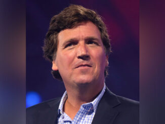 Tucker Carlson speaking with attendees at the 2022 AmericaFest at the Phoenix Convention Center in Phoenix, Arizona (PHOTO CREDIT: Gage Skidmore).