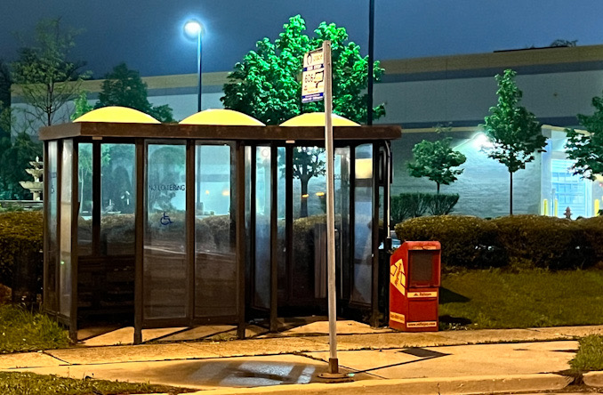 Bus stop shelter near the block of 400 block of West Algonquin Road; no prominent shelters are visible in the block of 400 East Algonquin Road in Arlington Heights