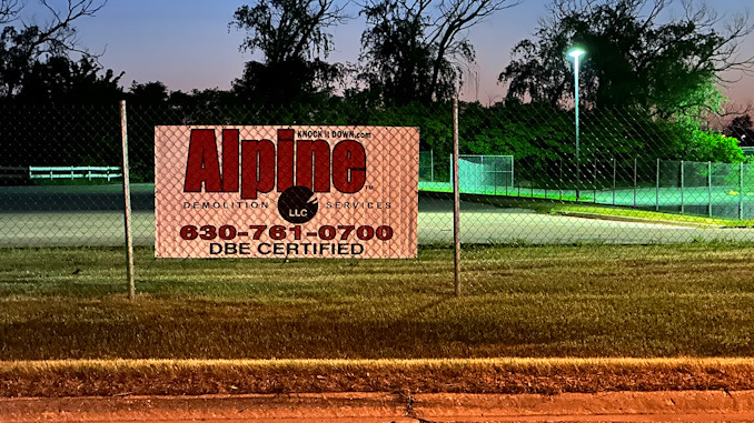 Alpine Demolition Services  banner near a Euclid Avenue entrance near the former Ditka's Trackside restaurant (CARDINAL NEWS)