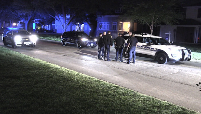 Suspect in custody in this white Prospect Heights police SUV for a gun-related investigation in Prospect Heights on Dunton Avenue north of Euclid Avenue Arlington Heights, Sunday, May 21, 2023 about 3:30 a.m. (CARDINAL NEWS)