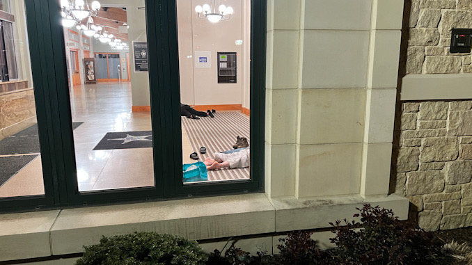 Four people camped out in the Arlington Heights police station vestibule overnight in early May, 2023