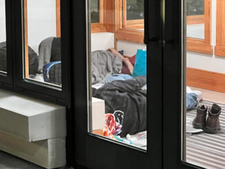 Four people camped out in the Arlington Heights police station vestibule overnight in early May, 2023.