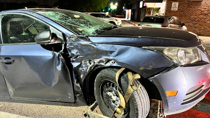 Blue car damaged in a fatal crash with a motorcycle at Devon Avenue and Ridge Avenue in Elk Grove Village on Thursday, May 18, 2023