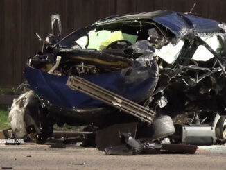 Teens were traveling in this blue vehicle, which came to rest as the center vehicle among three vehicles located on Dundee Road east of Schoenbeck Road after a fatal crash Tuesday, May 16, 2023