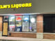 Elms Liquors front glass door boarded up after a burglary at the liquor store at 906 West Northwest Highway in Arlington Heights overnight from Sunday, May 7, 2023 to Monday May 8, 2023