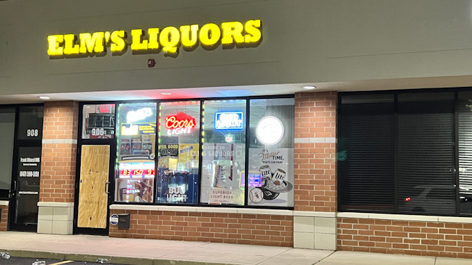 Elm's Liquors front glass door boarded up after a burglary at the liquor store at 906 West Northwest Highway in Arlington Heights overnight from Sunday, May 7, 2023 to Monday May 8, 2023