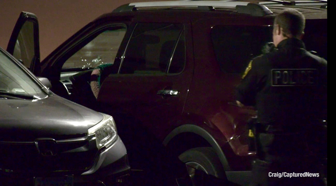 Victim's vehicle with a bullet hole in the windshield after a shooting that wounded two people in Waukegan on Wednesday, May 24, 2023 (PHOTO CREDIT: Craig/CapturedNews)